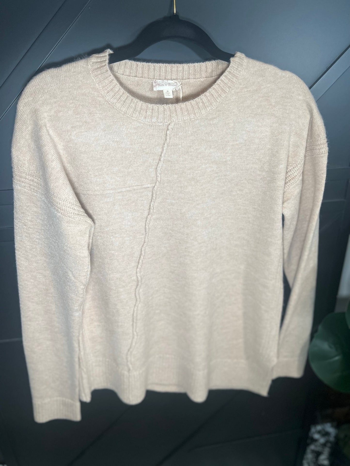 ASYMMETRICAL SWEATER